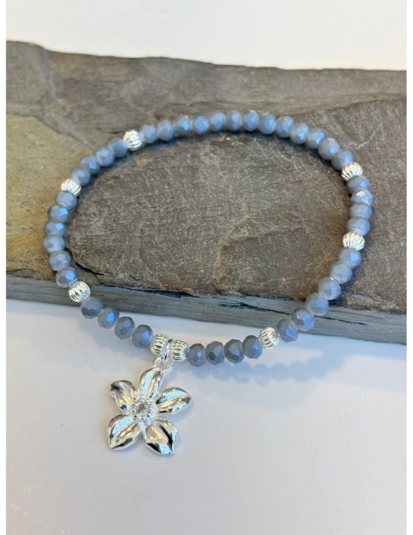 PULSERA BAÑADA EN PLATA CRISTALES CELESTES