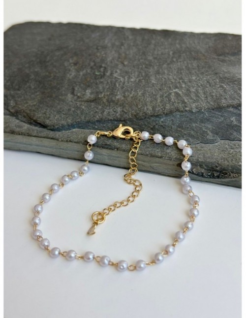 PULSERA BAÑADA EN ORO PIEDRA BLANCA
