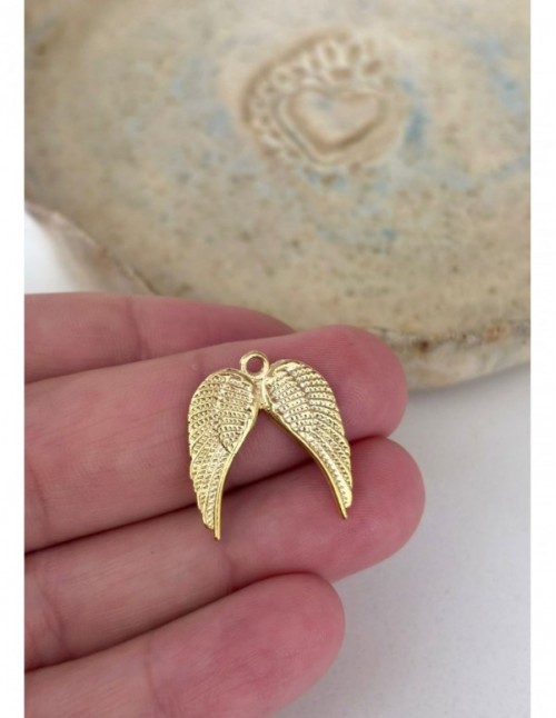 DIJE BAÑADO EN ORO ALAS