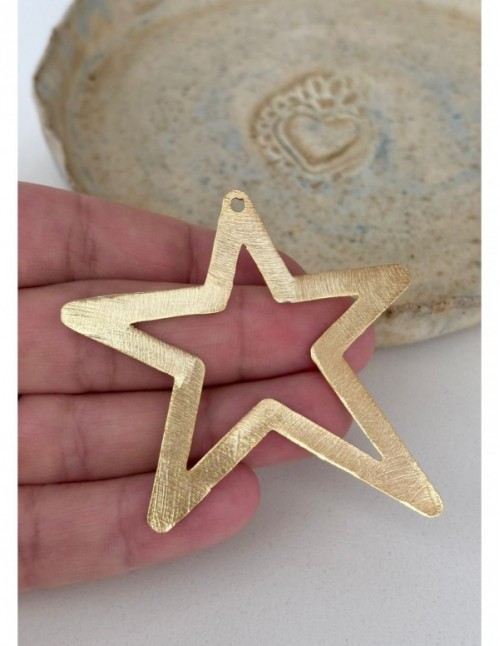 DIJE BAÑADO EN ORO ESTRELLA