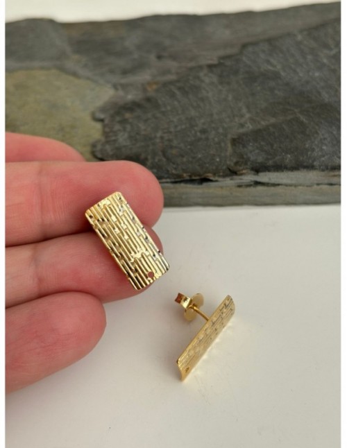 BASE BAÑADA EN ORO