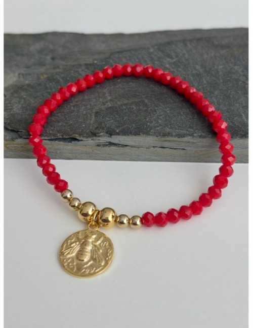 PULSERA ELASTICADA BAÑADA EN ORO CRISTALES ROJOS