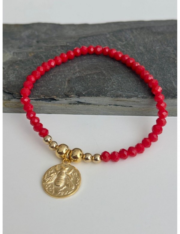 PULSERA ELASTICADA BAÑADA EN ORO CRISTALES ROJOS