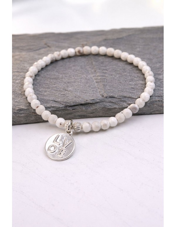 PULSERA BAÑADA EN PLATA PIEDRAS BLANCAS