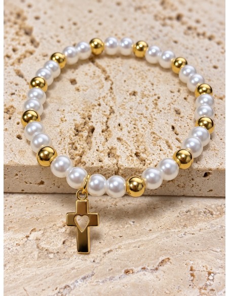 Pulsera elasticada de perlas con cruz corazón baño de oro