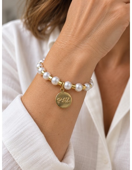 Pulsera elasticada de perlas con medalla Paz baño de oro