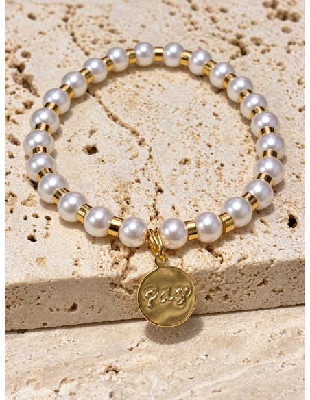 Pulsera elasticada de perlas con medalla Paz baño de oro