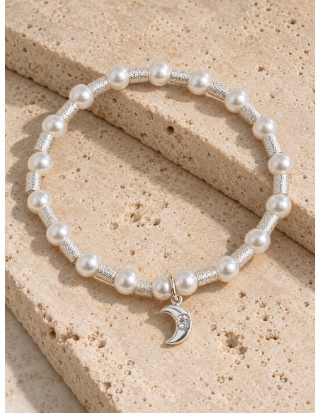 Pulsera elasticada de perlas con luna baño de plata